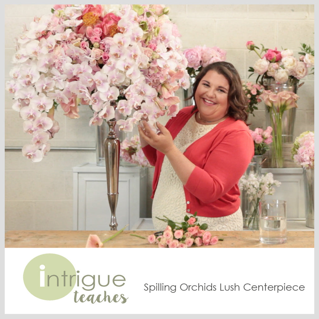 Spilling Orchids Lush Centerpiece
